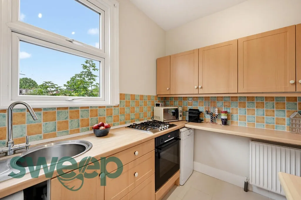A spotless beech kitchen after a Sweep clean